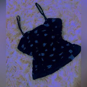 Black silky, cropped tank with blue flowers